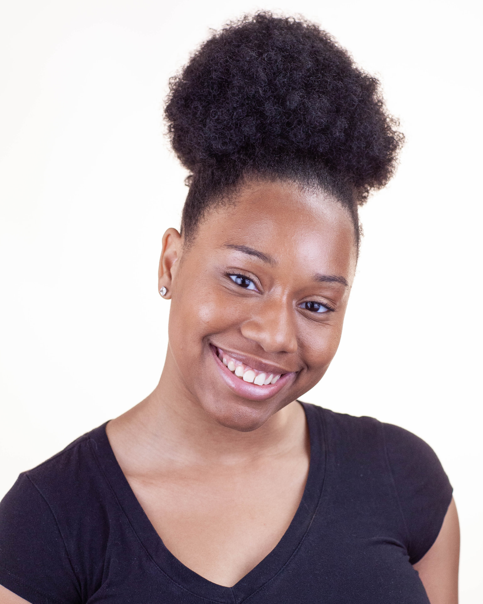 Smiling commercial headshot of Taniya Patrick