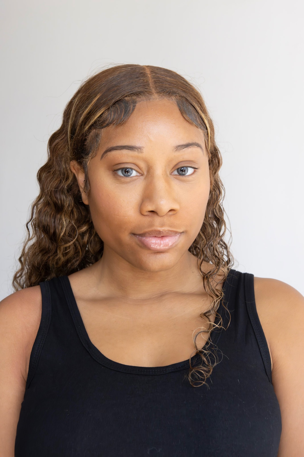 Natural close-up agency digital headshot of Taniya, no makeup